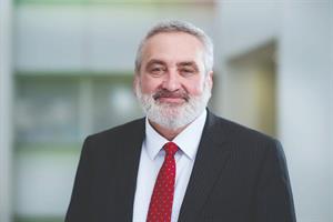Healthcare charity’s former chief paid almost £1m last year